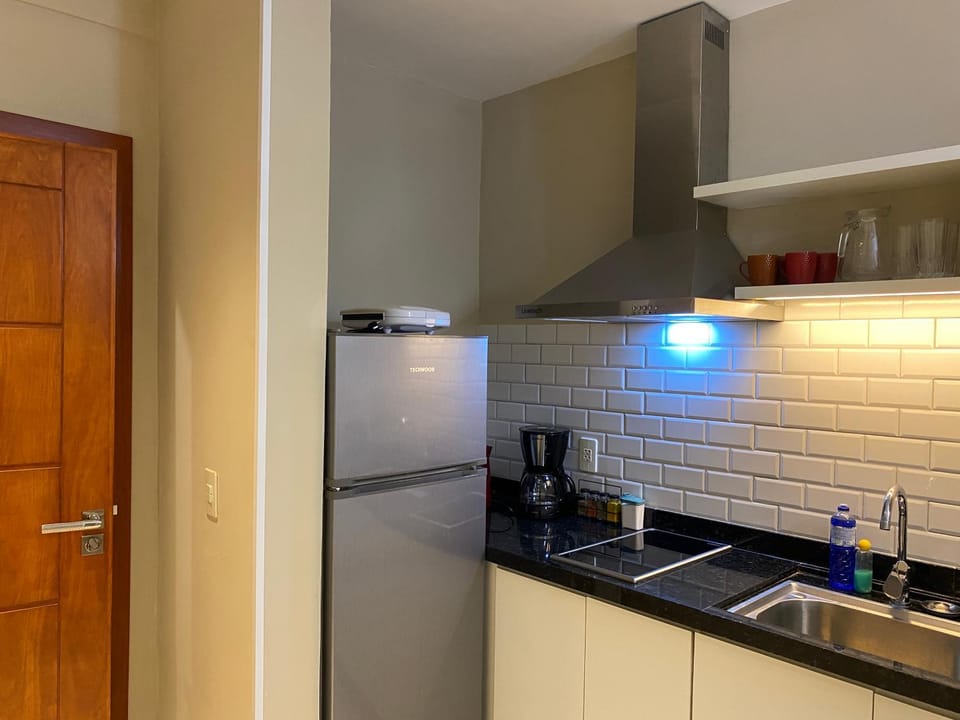 Kitchen or kitchenette, stove, toaster