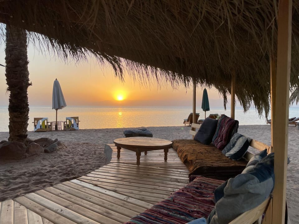 Natural landscape, Living room, Seating area, Beach, Sunrise, Sunset, sunbed