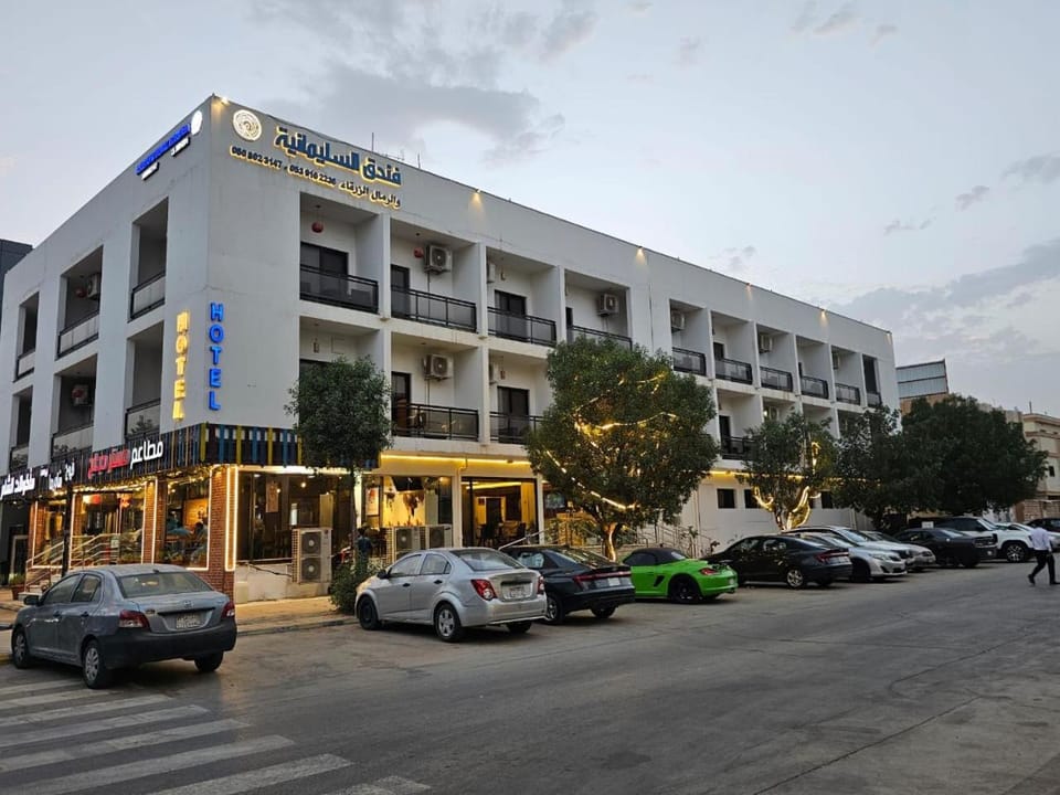 Property building, Day, Neighbourhood, City view, Street view, Location, Parking