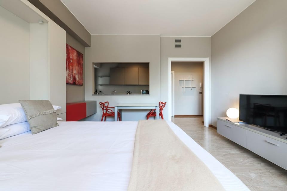 Communal lounge/ TV room, Bed, TV and multimedia, Living room, Photo of the whole room, Seating area, Bedroom