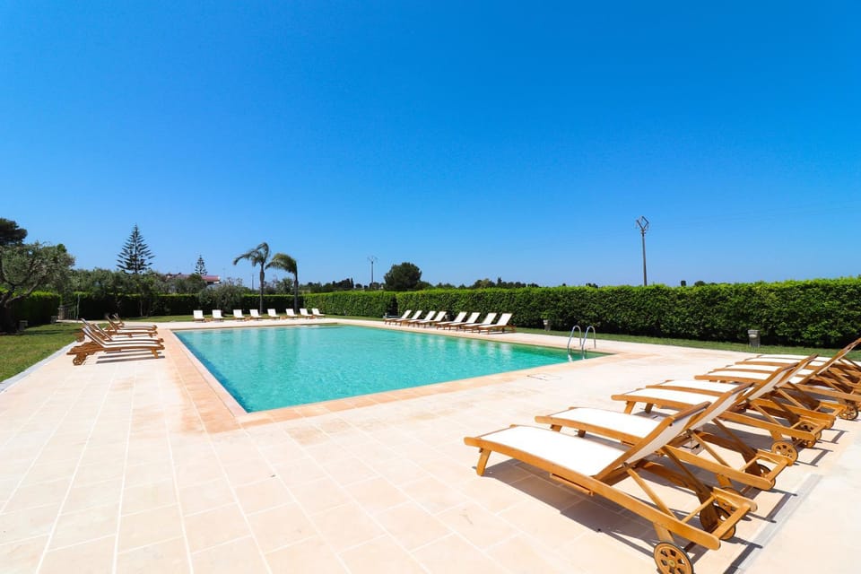 Property building, Living room, Swimming pool