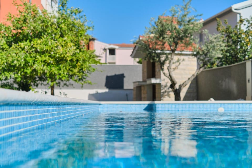 Property building, Day, Pool view, Swimming pool