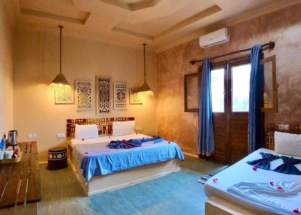 Bed, Photo of the whole room, Bedroom, towels, air conditioner