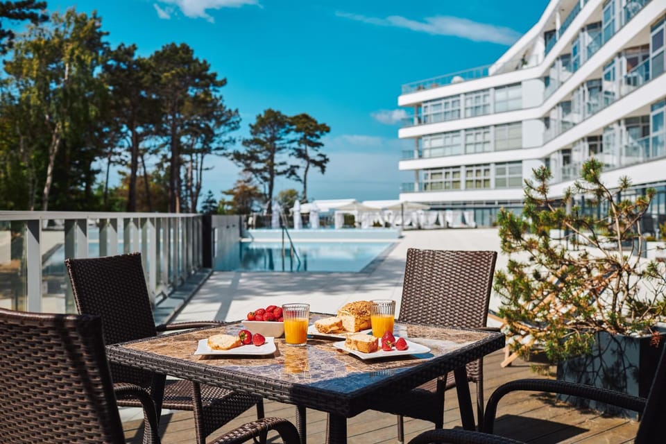 Property building, Patio, Balcony/Terrace, Pool view, Swimming pool