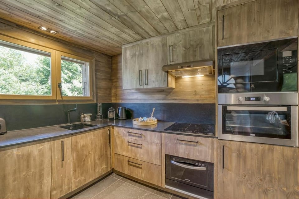 Kitchen or kitchenette, dishwasher, oven, stove, toaster