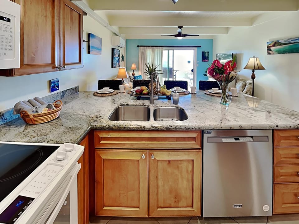 Kitchen or kitchenette, Living room, Seating area, dishwasher, microwave, stove, air conditioner