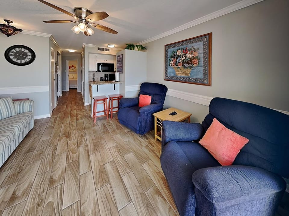 Kitchen or kitchenette, Living room, Seating area, furniture, air conditioner