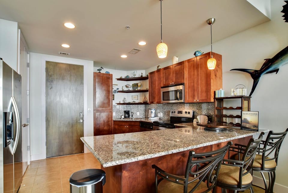 Kitchen or kitchenette, Seating area, furniture, microwave, oven, stove, kitchen