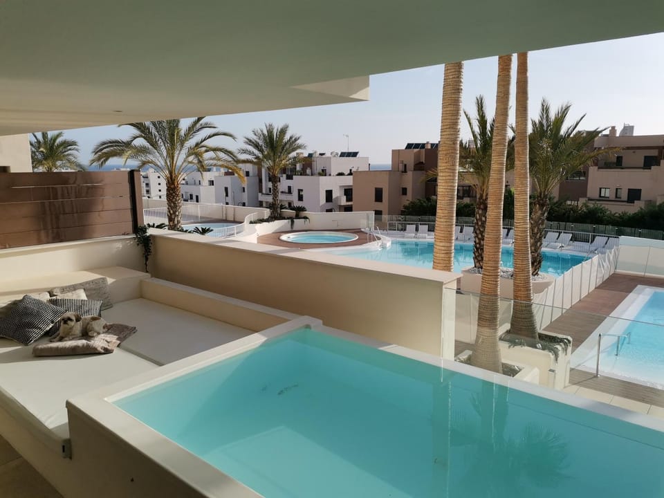Property building, Living room, Swimming pool