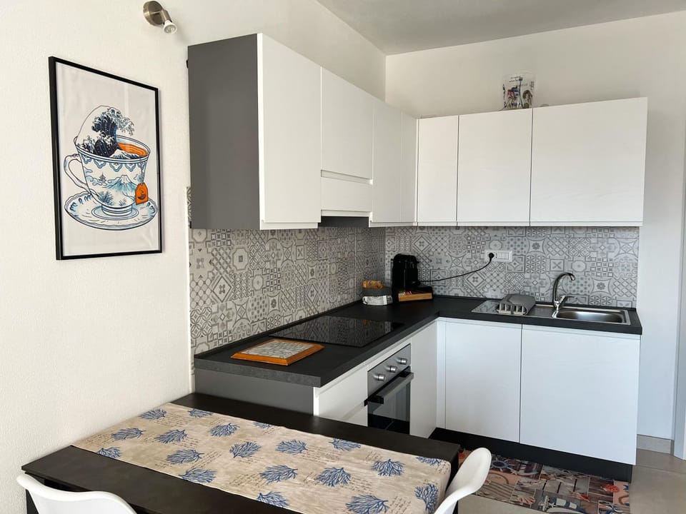 Kitchen or kitchenette, stove, kitchen