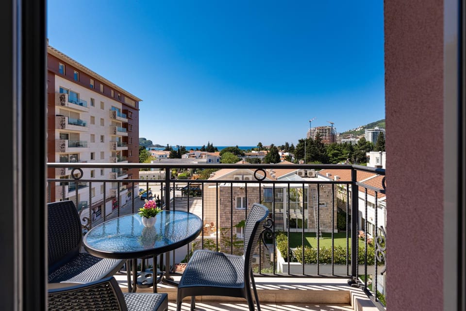 Property building, Patio, Day, Natural landscape, View (from property/room), Balcony/Terrace, Living room, Seating area, Dining area, Mountain view, Sea view