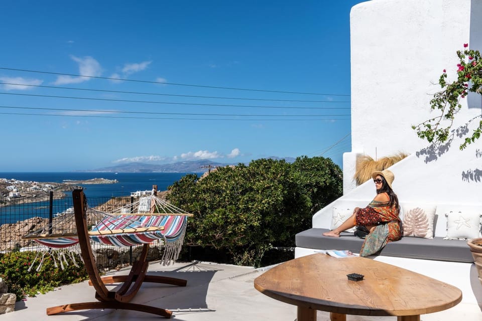 Patio, Day, People, View (from property/room), Balcony/Terrace, Seating area, Sea view, group of guests
