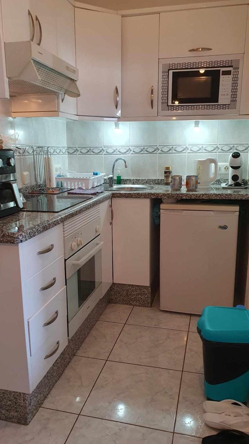 Kitchen or kitchenette, oven, stove, toaster