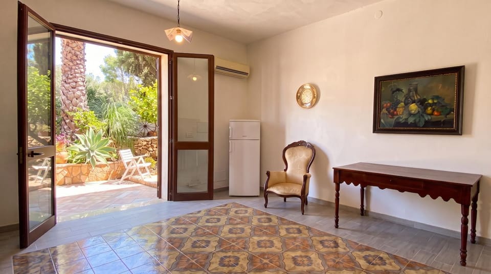 Kleines Refugium unter Palmen. Apartment in Sicily