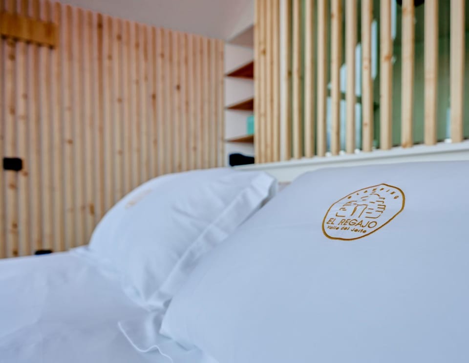 Bed, Property logo or sign