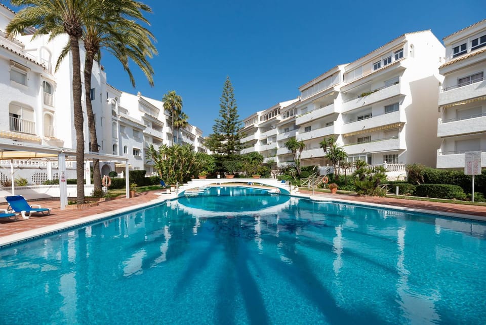 Property building, Living room, Swimming pool