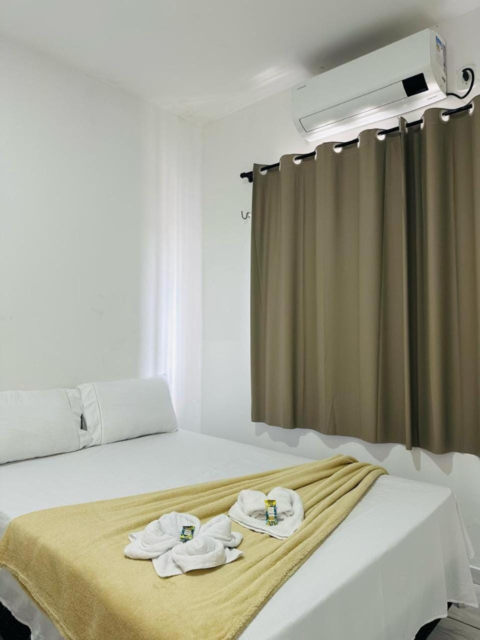 Bed, Photo of the whole room, Bedroom, towels, air conditioner