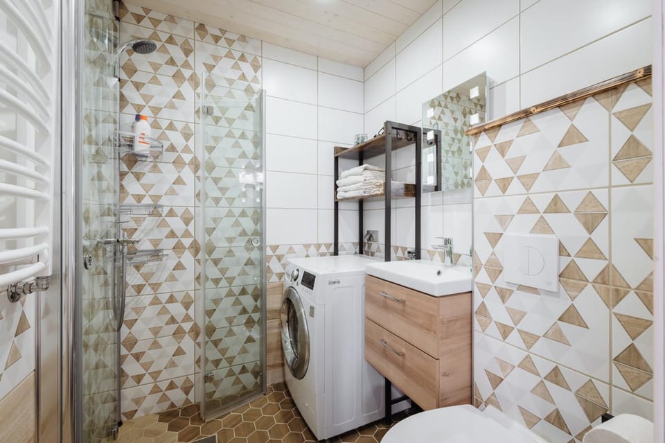 Shower, Toilet, Bathroom, towels, washing machine, dryer