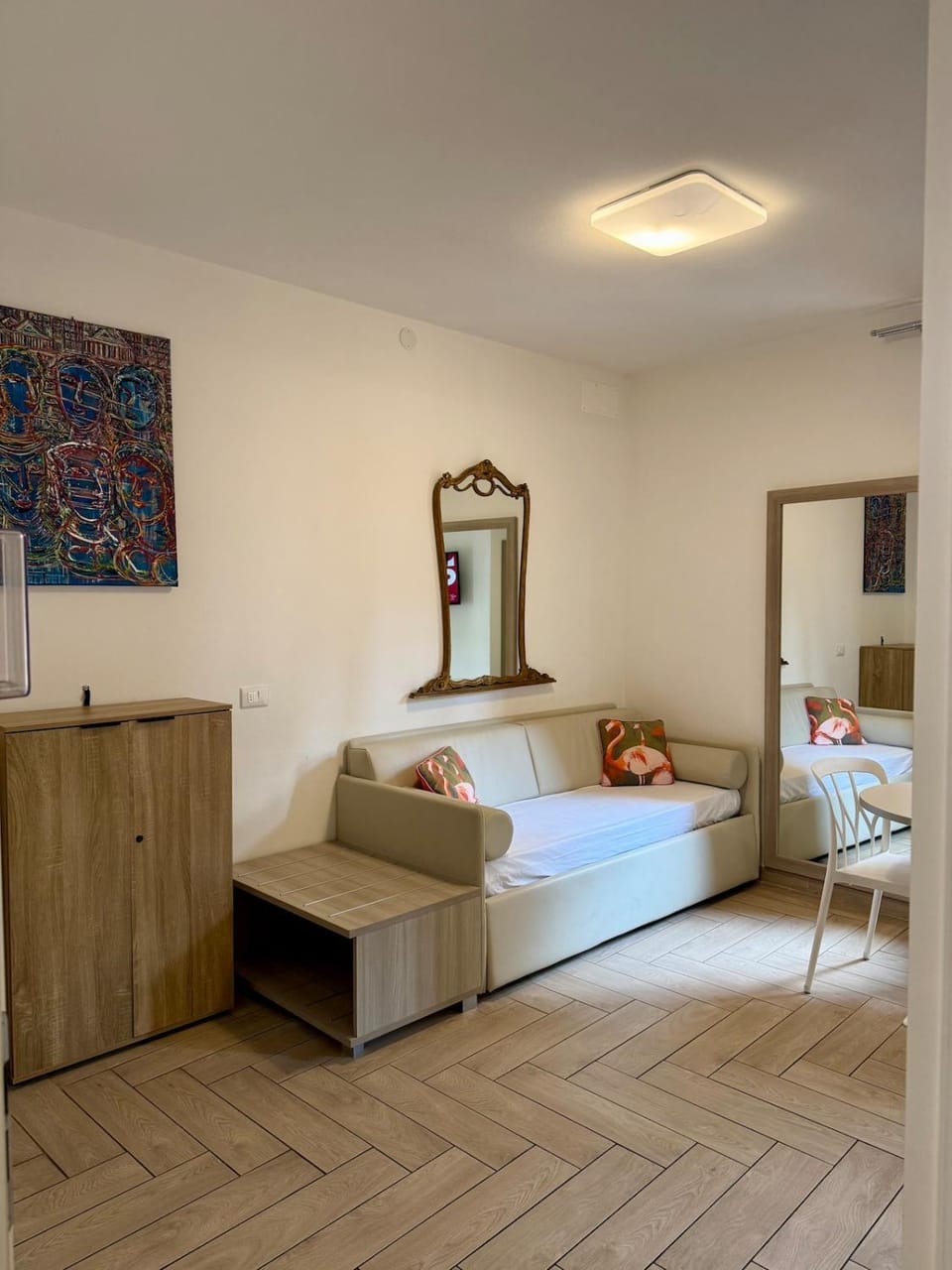 Bed, Living room, Seating area, Bedroom