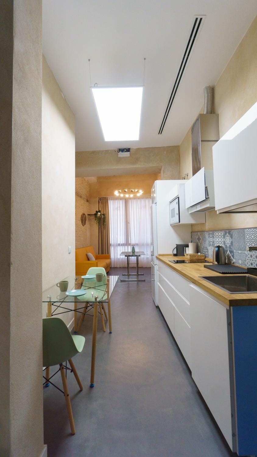 Kitchen or kitchenette, Photo of the whole room, Dining area, stove