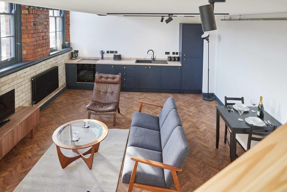 Kitchen or kitchenette, Living room, Seating area, Dining area