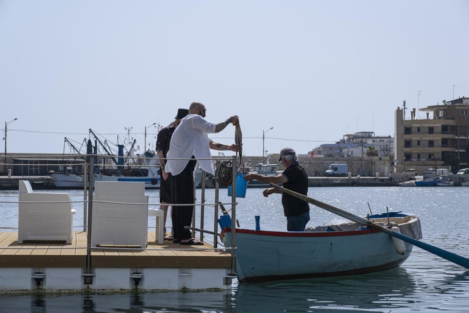 Houseboat Floatart Experience Bisceglie Docked boat in Apulia