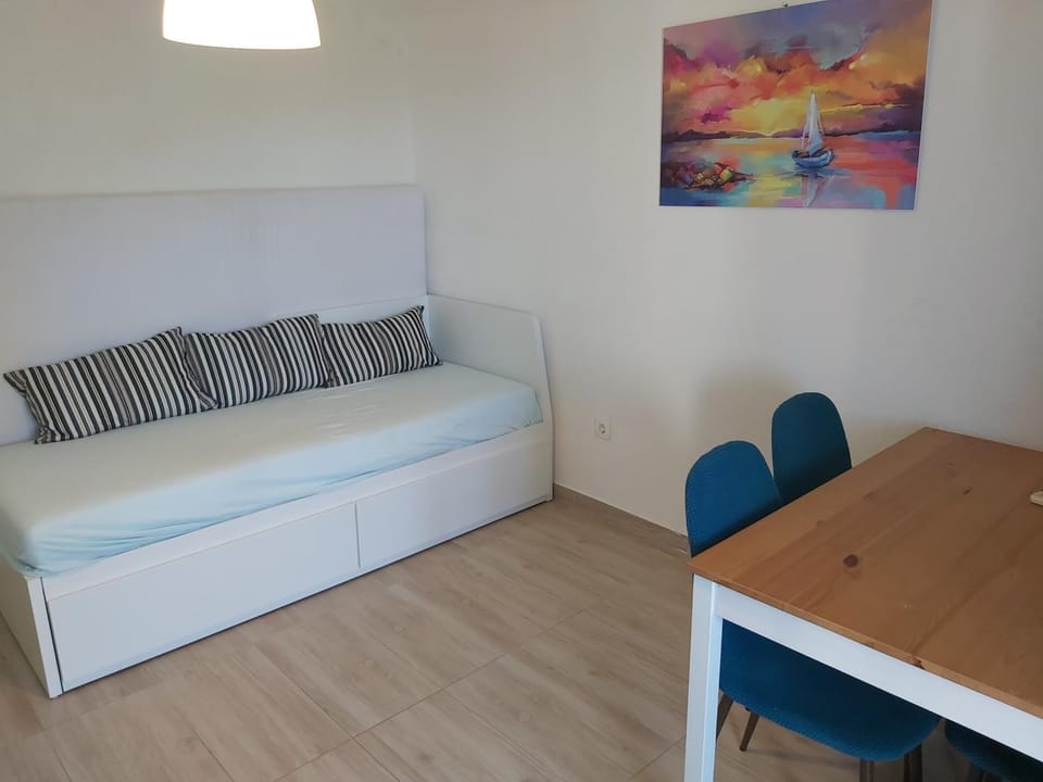 Bed, Living room, Seating area