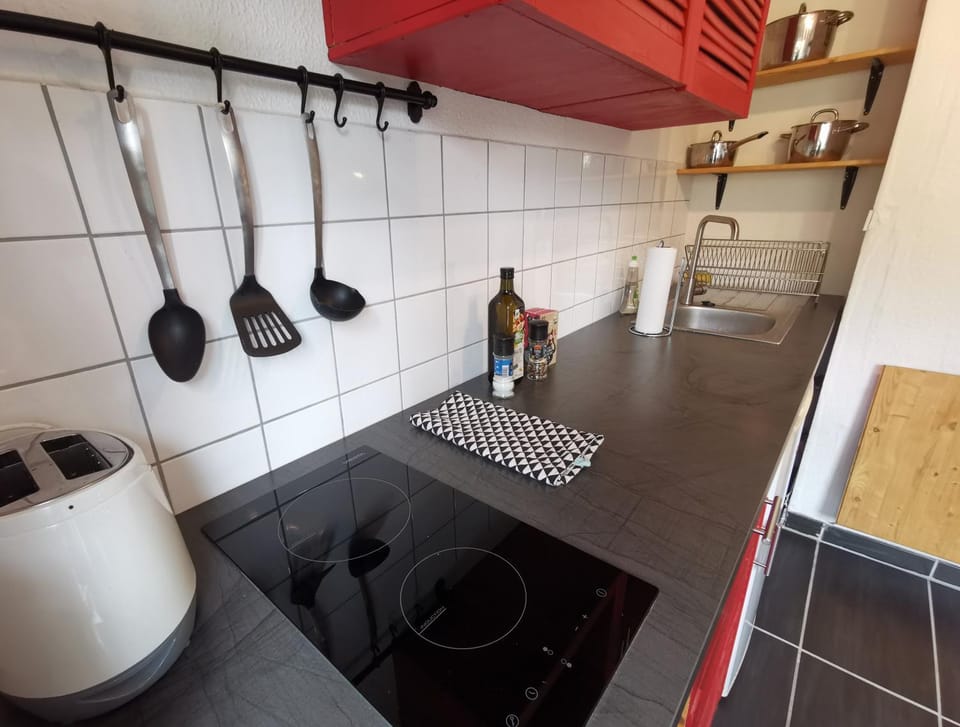Kitchen or kitchenette, stove