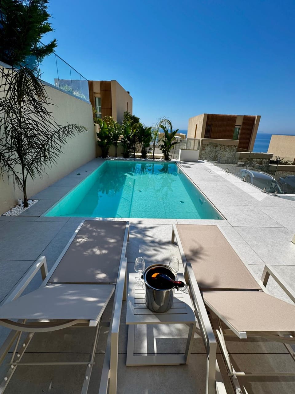 Patio, Day, Natural landscape, Pool view, Swimming pool, sunbed
