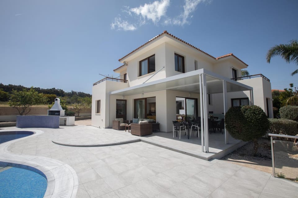 Property building, BBQ facilities, Seating area