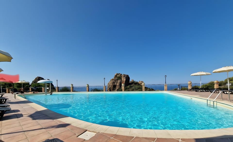 Property building, Living room, Swimming pool