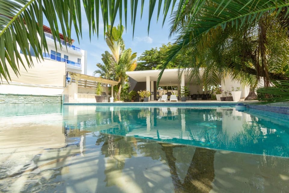 VILLA LAS ORQUIDEAS, TERRAZA, BBQ, PISCINA FAMILIAR, 5 Minutos de Playa Villa in Puerto Plata