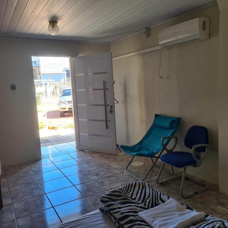 Kitnet casal e apartamento com lareira e vista jardim Apartment in State of Rio Grande do Sul