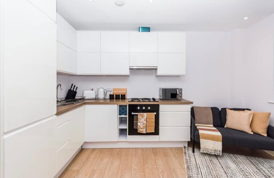 Kitchen or kitchenette, Living room, stove