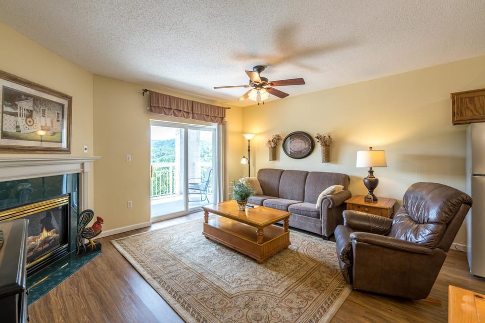 Balcony/Terrace, Living room, Seating area, Mountain view, fireplace, furniture