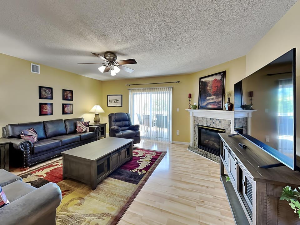 TV and multimedia, Living room, Seating area, fireplace, furniture, air conditioner