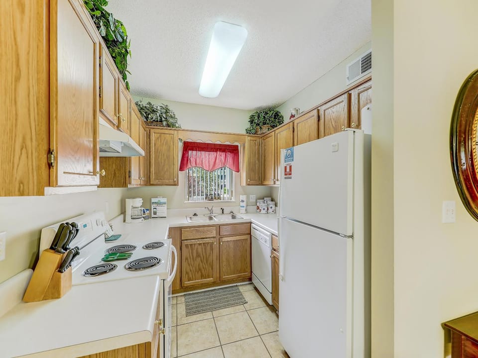 Kitchen or kitchenette, dishwasher, microwave, oven, stove, toaster, kitchen, air conditioner