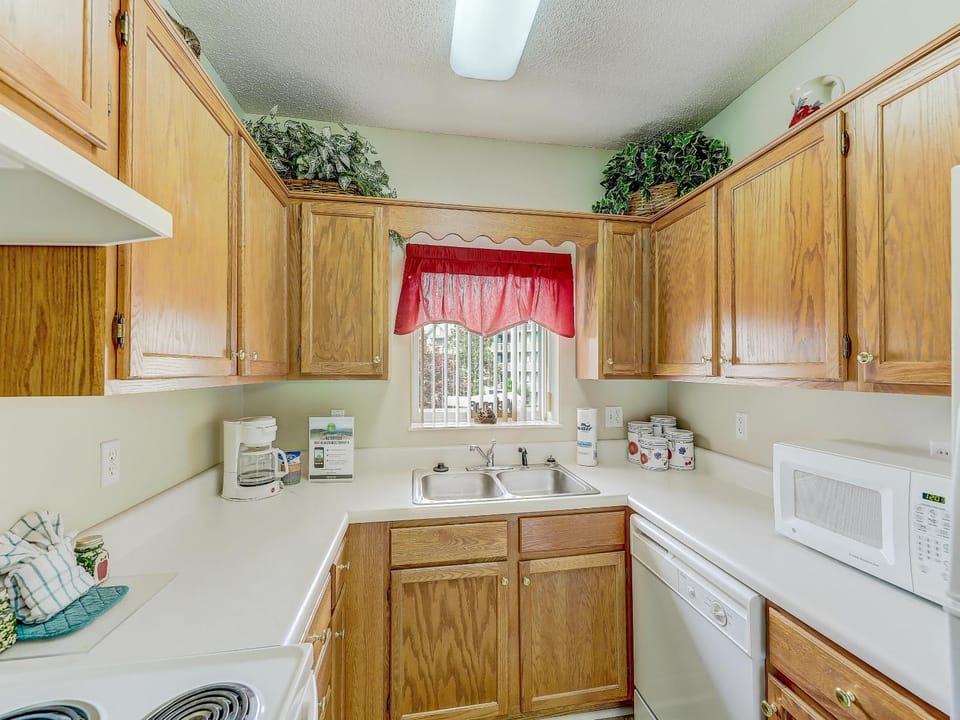 Kitchen or kitchenette, microwave, stove, toaster, kitchen