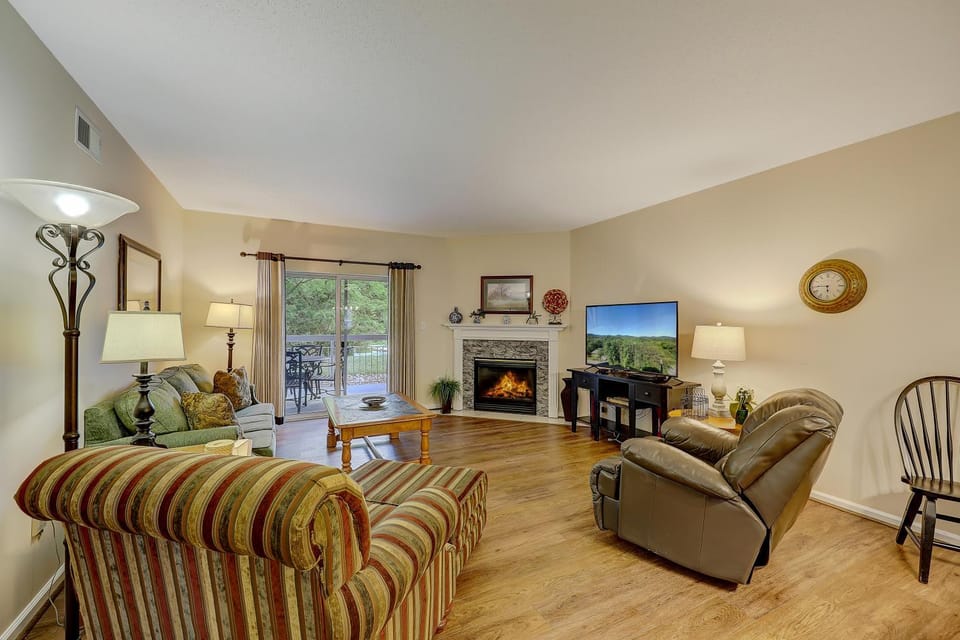 TV and multimedia, Balcony/Terrace, Living room, Seating area, Garden view, fireplace, furniture, air conditioner