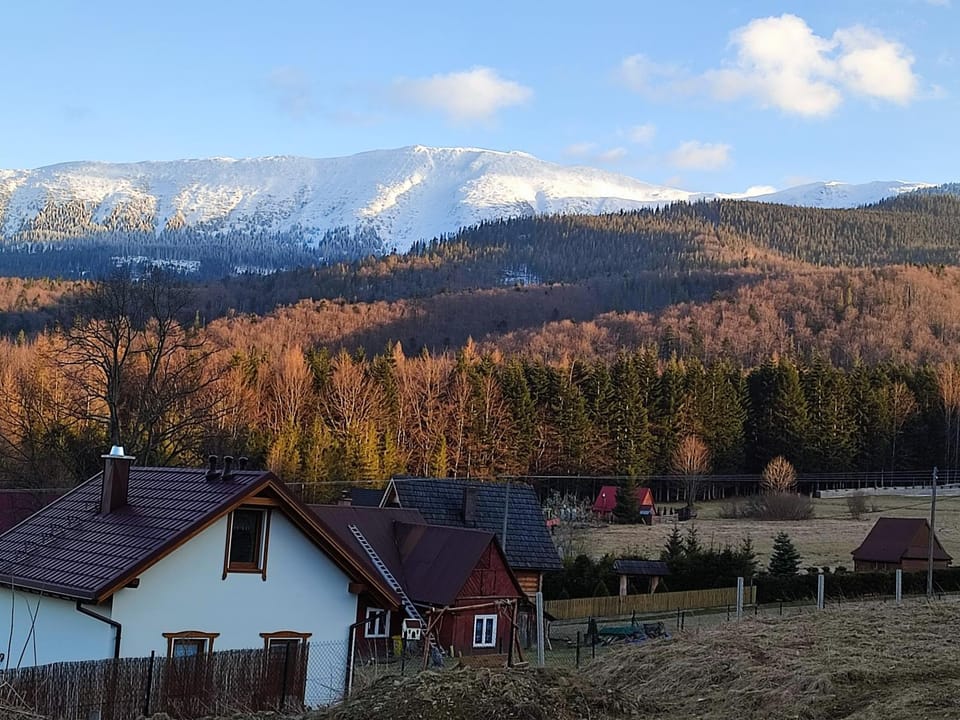 Property building, Nearby landmark, Natural landscape, Mountain view