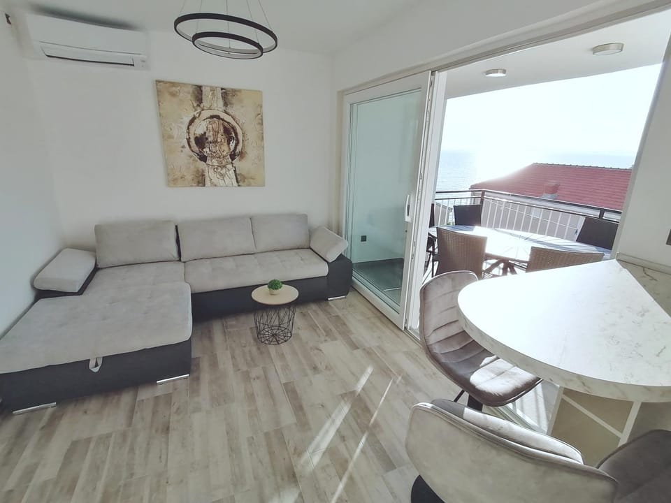 Living room, Seating area, Dining area, Sea view, air conditioner