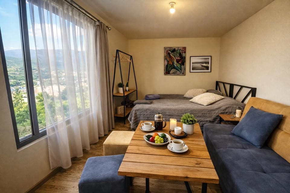Bed, Coffee/tea facilities, View (from property/room), Food and drinks, Photo of the whole room, Seating area, Dining area, Bedroom