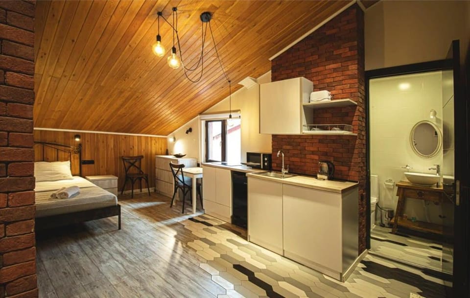 Top Location Cozy Wooden Ceiling Apt - by Wehost Apartment in Tbilisi, Georgia