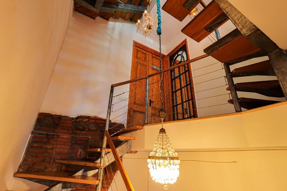 Colorful apt w a furnished terrace 2 min from Rustaveli avenue Apartment in Tbilisi, Georgia