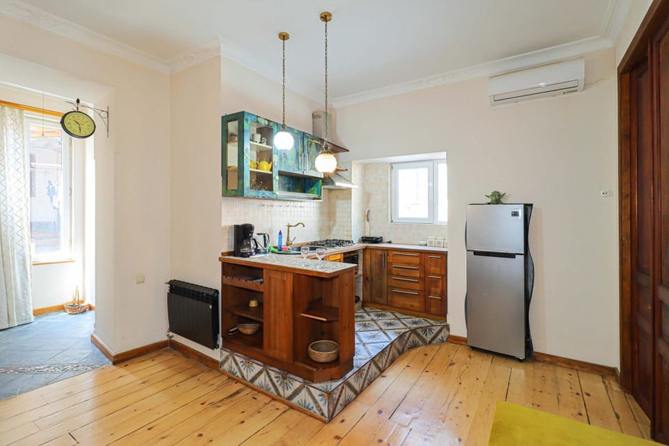 Colorful apt w a furnished terrace 2 min from Rustaveli avenue Apartment in Tbilisi, Georgia