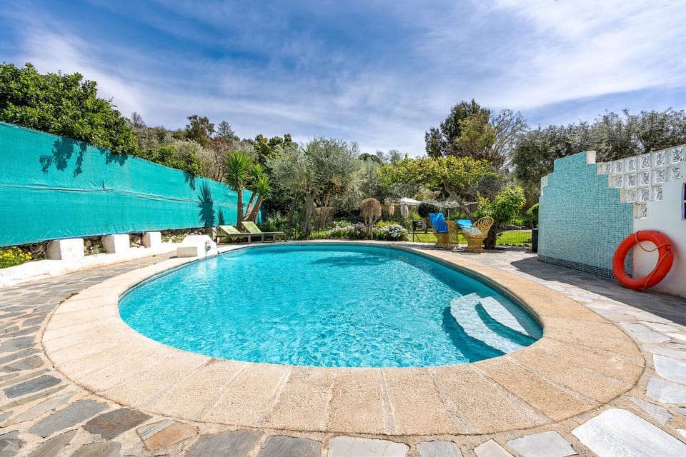 Property building, Living room, Swimming pool