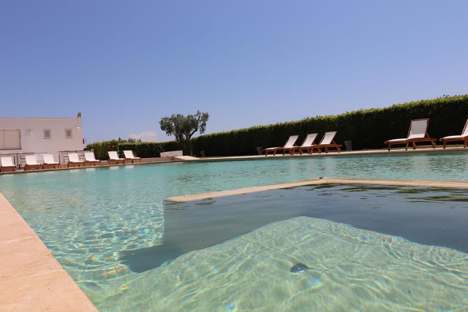 Property building, Living room, Swimming pool