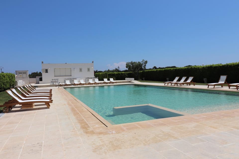 Property building, Living room, Swimming pool