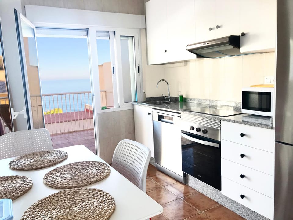 Natural landscape, Kitchen or kitchenette, Dining area, Sea view, dishwasher, minibar, pet friendly, toaster