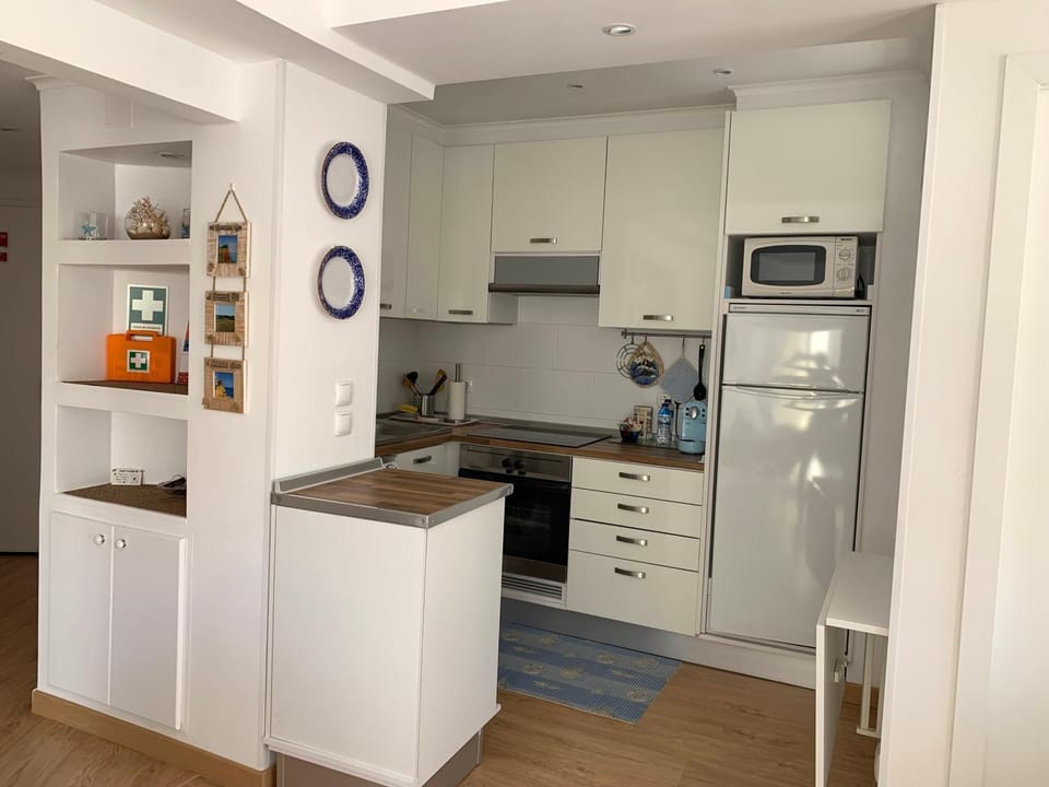 Kitchen or kitchenette, oven, stove, toaster
